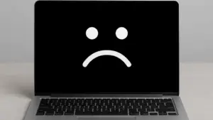 Sad lonely laptop powering an led wall